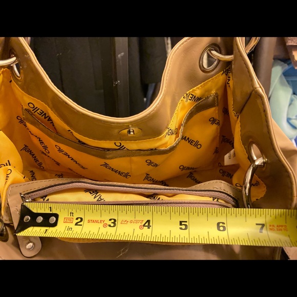 Tignanello, duo compartment, bucket style, zipper area below, a good baby bag. - Picture 11 of 14